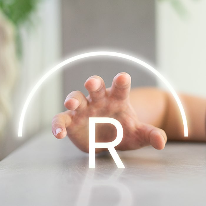 Thumbnail of my design project "radial" is showing a hand rotating the letter "R"